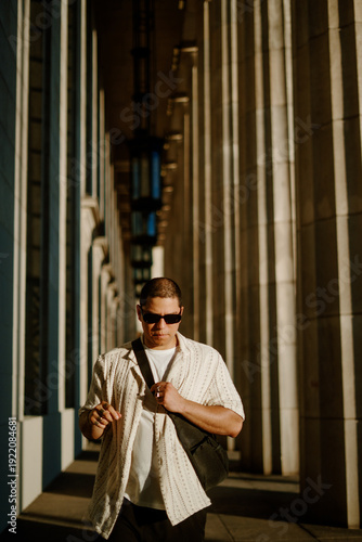 Wallpaper Mural The Man Walks Between Columns Of The City Torontodigital.ca