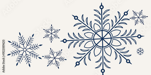 A collection of intricate and delicate snowflakes in various sizes and designs