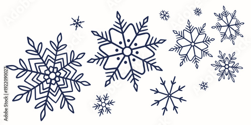 Intricate blue snowflakes and stars on a white background