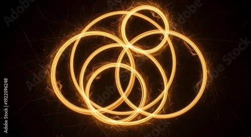 Glowing yellow light trails in a dark background