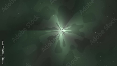 Abstract green light burst in dark space with glowing effect.