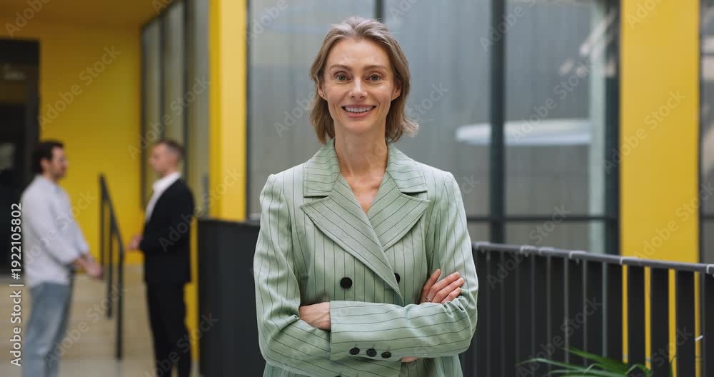 custom made wallpaper toronto digitalPortrait of confident HR or team member standing in modern corporate office corridor with folded arms, representing company management, professional success and career. Human resources and business