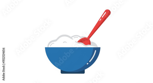 Bowl of white fluffy rice with a red spoon.