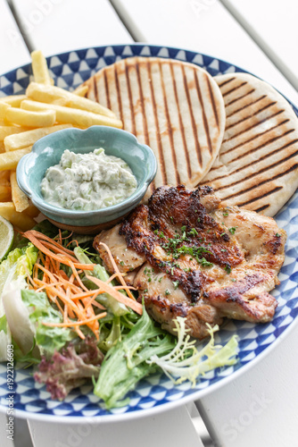 Wallpaper Mural grilled chicken breast with porario fries and salad meal Torontodigital.ca