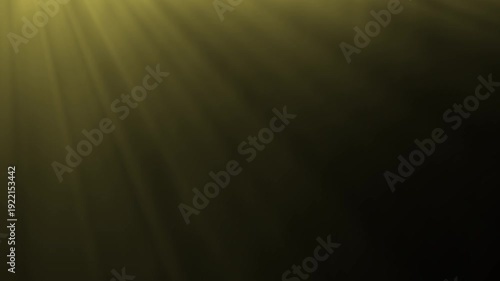 Golden light rays emanating from the top corner in darkness, creating a divine or mystical atmosphere effect