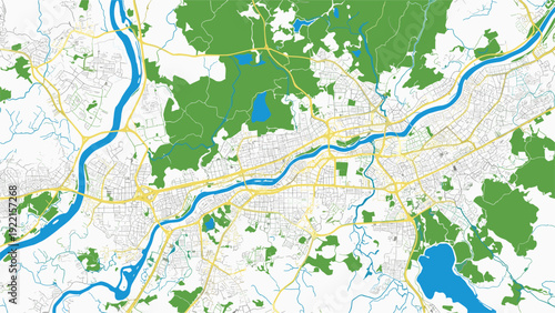 Detailed city map featuring a winding river, an extensive network of roads and highways, and large green park areas throughout.