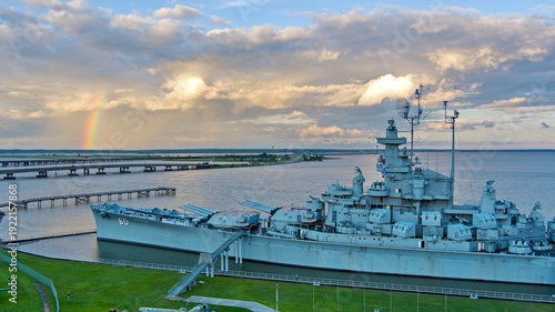 Rainbow after a storm over the battleship