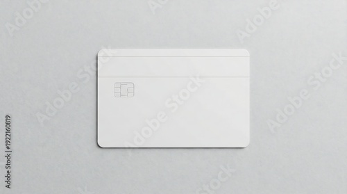 A minimalist blank white credit card or ID card placed on a plain gray background, showcasing a simple, modern design