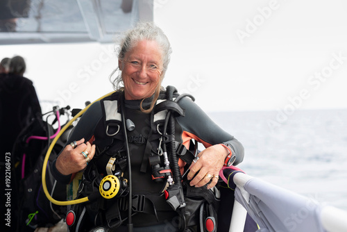 Portrait of a Joyful Woman Scuba Diver