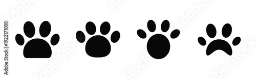 Four distinct icons of dog paw prints in black