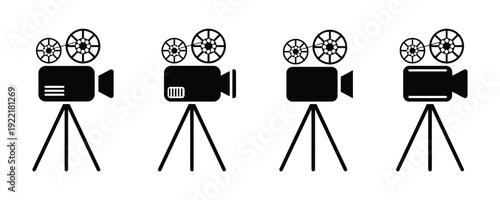 Group of four vintage black film camera icons on tripods