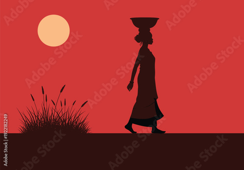 Silhouette of Rural Woman Carrying Basket on Head