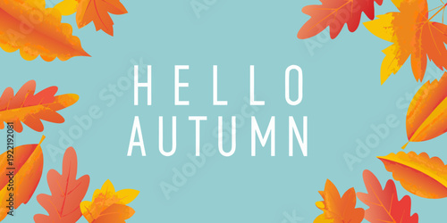 Hello autumn text with vibrant orange maple leaves on a blue background