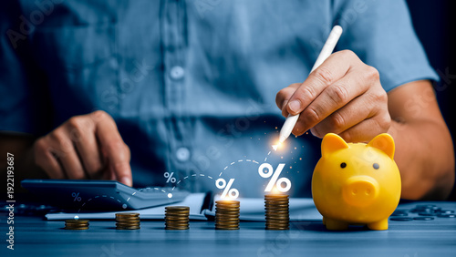 Tableau sur toile Financial planning and savings growth strategy with piggy bank, stacked coins an