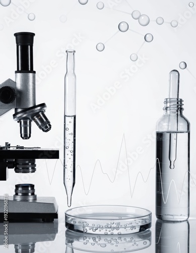 Microscope with laboratory glassware, petri dish and pipette lab validation background