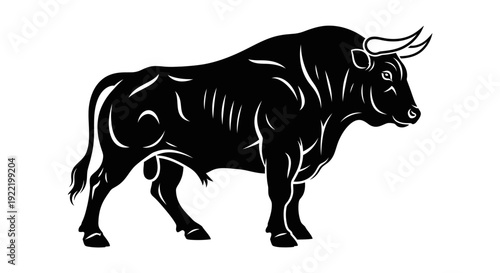 Majestic black bull standing strong with curved horns