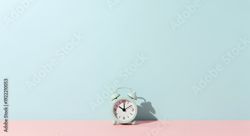 Alarm clock on colorful background