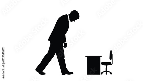Overwhelmed businessman silhouette walks past tiny office desk, symbolizing job stress, career disappointment, or feeling insignificant.