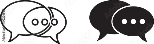 Close-up of a young woman with wavy brown hair and natural makeup, surrounded by iridescent soap bubbles on a grey background