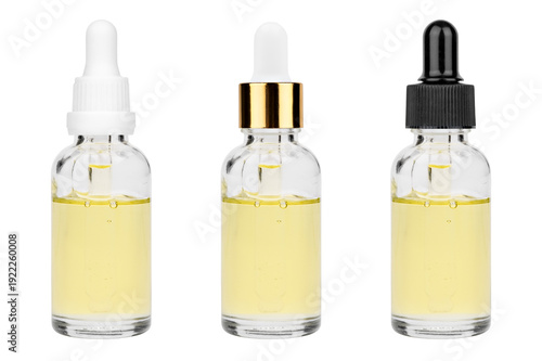 Tableau sur toile Glass bottle with cuticle oil and facial serum isolated on white background