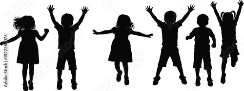 Silhouettes of happy diverse children jumping and playing together in a row with arms raised against a clean white background.