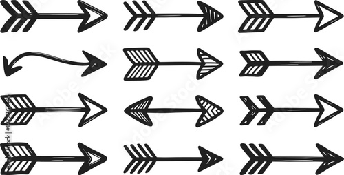Set of hand drawn ethnic tribal arrows with feathered tails and geometric patterns isolated on white background black doodle vectors.