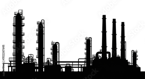 Silhouette of an industrial plant against a bright white sky, showing complex structures.
