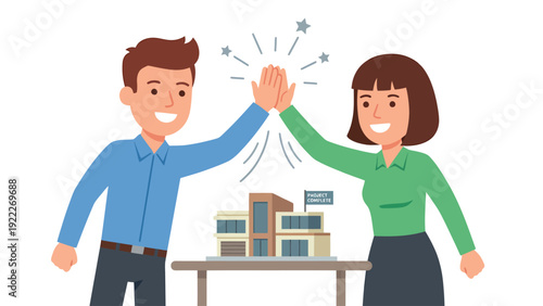 Business partners celebrate successful real estate project with a high-five over a building model, symbolizing teamwork and achievement.