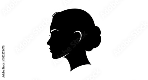 Silhouette of a womans profile, showcasing elegant hairstyle and facial features.