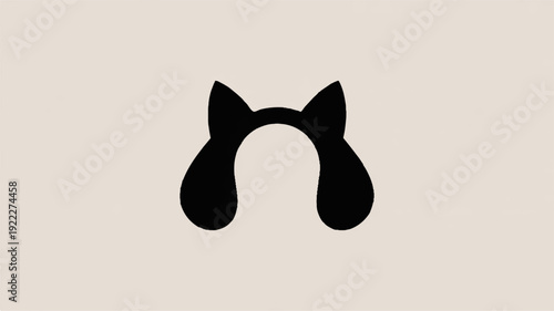 Black cat ears headband silhouette on beige background minimalist fashion accessory icon