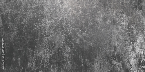 A monochromatic heavily wall textured background shows a distressed surface with various shades of gray and dark tones