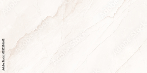 A close up view of a light beige marble texture with subtle veining patterns perfect for backgrounds
