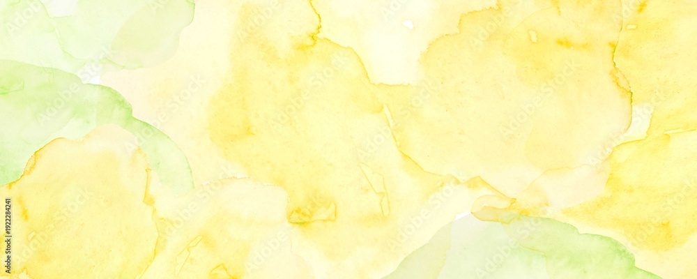 Obraz premium 黄色の水彩絵の具で描いたイエローの花びらの背景
