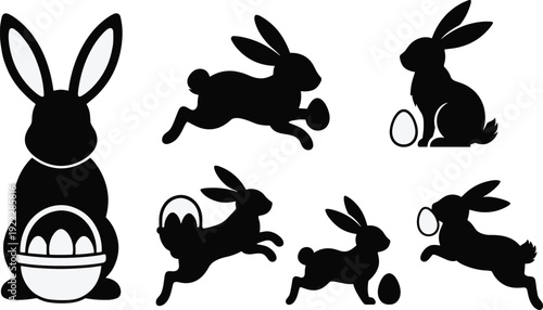 Black silhouettes of rabbits and eggs on white background easter bunny