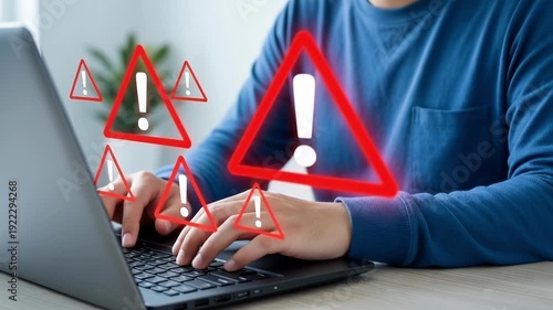Man working on laptop with warning signs floating above keyboard in office high quality 4k video