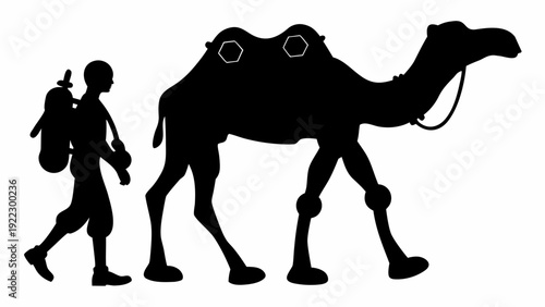 Silhouette of man walking with camel through desert landscape