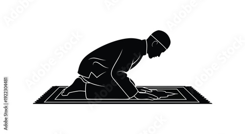 A man praying on a rug a distinct black silhouette