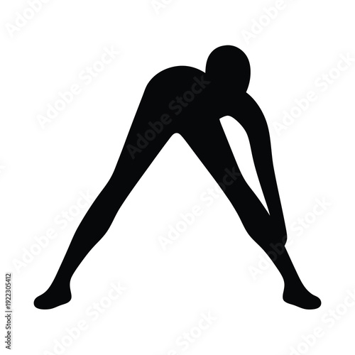 Silhouette of a person stretching with legs wide apart and touching shin