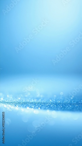 Soft blue background with scattered sparkling lights, creating a dreamy, festive glow across the scene