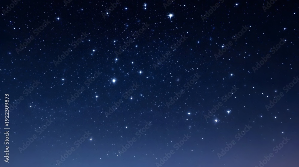Fototapeta premium A deep blue night sky filled with countless bright twinkling stars and celestial bodies