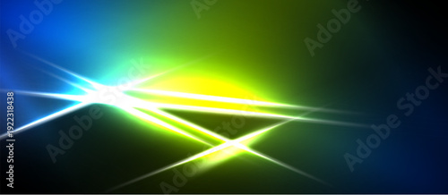 Bright light streaks radiate from center. Vivid blue, green, yellow hues blend into darkness. Abstract energy flows across space.