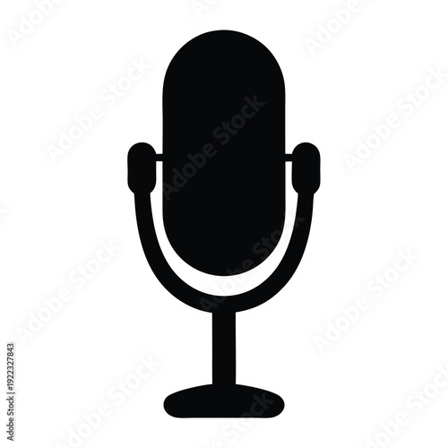 An isolated silhouette of an old fashioned microphone in vector format