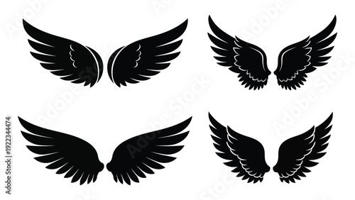 A set of four black wing designs on a white background isolated on white background, Vector