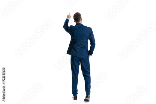 Ambitious businessman pointing finger upwards