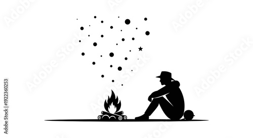 Man sitting by campfire under starry night sky in peaceful solitude