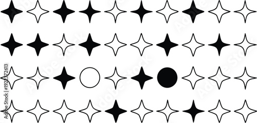 A repeating pattern of black and white four pointed star and round shapes on a white surface