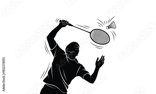 Badminton player hitting shuttlecock