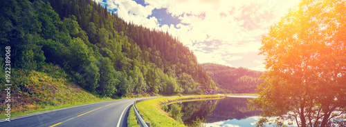 Driving a car on a mountain road along the fjord. Nature Norway