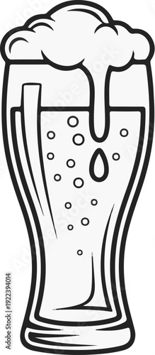 Tall glass filled with bubbly liquid and frothy head