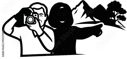 Two people enjoying a scenic view, one photographing the mountains